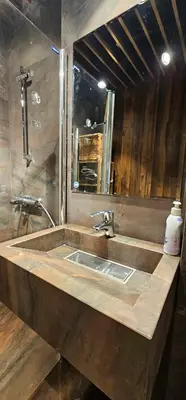 a bathroom with a sink and a mirror at Elegant and cozy apartment in Sofia