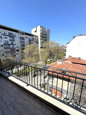 a balcony with a view of a city with buildings at Cozy Home In Central Plovdiv in Plovdiv