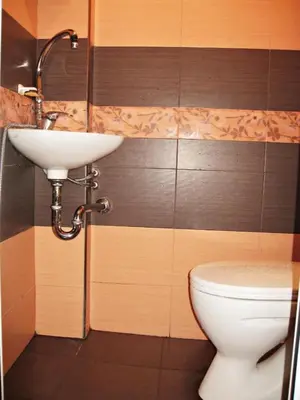 a bathroom with a sink and a toilet at Apartment Mariza in Plovdiv