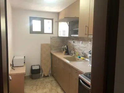 a kitchen with a sink and a counter top at При Бети in Sandanski