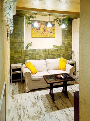 a living room with a couch and a table at Apartment Lion's bridge 1 - Top Center in Sofia