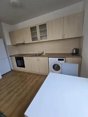 a kitchen with a sink and a washing machine at Paradise Locked in Sofia