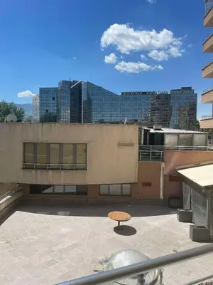 a view of a building with a table on the roof at Park Residence in Sofia
