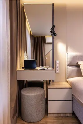 a bedroom with a desk with a laptop and a bed at TOP Center apt 'Pemena' FREE Private Parking in Plovdiv