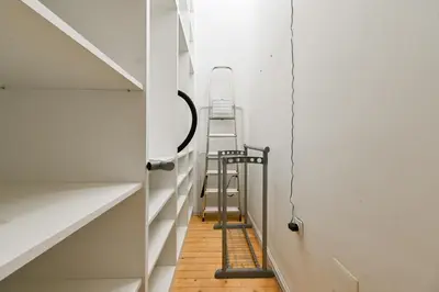 a room with a ladder next to a staircase at Luxory in Sofia