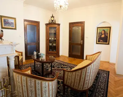 a dining room with a table and chairs at The Executive Escape Sofia in Sofia