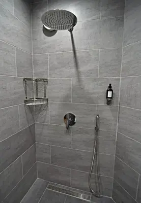 a shower with a shower head in a bathroom at Oblivion in Velingrad