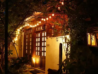 a house with a door with lights on it at Anna's downtown loft in Plovdiv