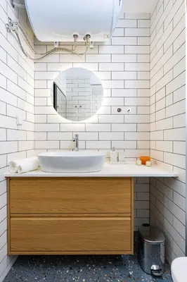 a bathroom with a sink and a mirror at Stylish apt 'Photo Booth' with an amazing location in Plovdiv