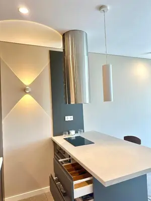 a kitchen with a sink and a counter top at Апартамент В 54 в Сграда МОНА in Sofia