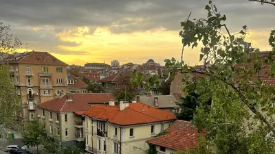 a view of a city with houses and buildings at Central 1-Bedroom Apartment with Balcony & View in Sofia