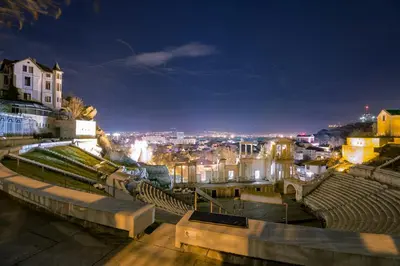 a view of a city at night at Azuuro - 1BD near the city center by Flat Manager in Plovdiv