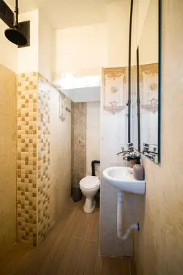 a bathroom with a sink and a toilet at Sunny Top Floor Apartment near Tokuda Hospital & Paradise Mall in Sofia