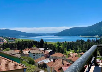 a view of a town and a lake at Ardo Hill Spa Hotel and Restaurant in Sarnitsa