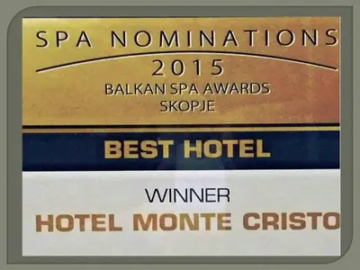 a framed picture of a hotel sign with the words spautions at Hotel Monte Cristo in Blagoevgrad