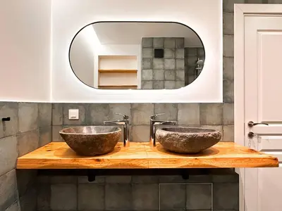 two sinks on a wooden counter in a bathroom at For Those Who Want the Best City Views and Style in Sofia