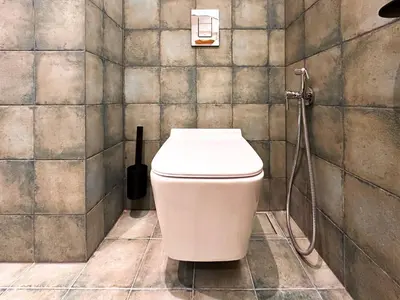 a bathroom with a toilet and a shower at For Those Who Want the Best City Views and Style in Sofia