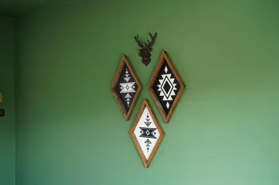 a wall with three crosses on a green wall at NDK Skyline Studio in Sofia