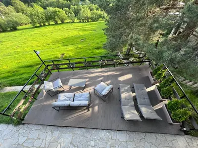 an overhead view of a deck with couches and chairs at Alpine View Villa in Razlog