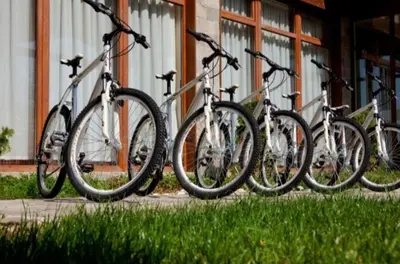 a group of bikes parked in front of a building at Crystal Apartment Bansko in Bansko