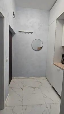 a room with a mirror and a tile floor at Urban Stay Sofia in Sofia