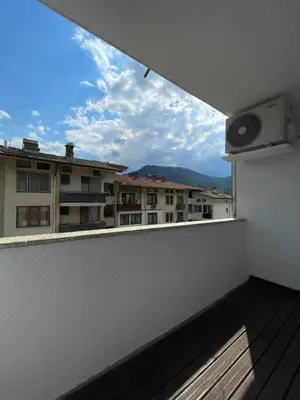 a balcony with a view of a building at Апартамент Кashmir in Smolyan