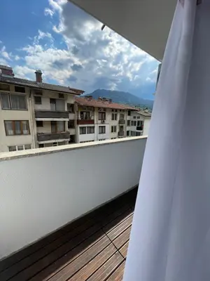a balcony with a view of some buildings at Апартамент Кashmir in Smolyan