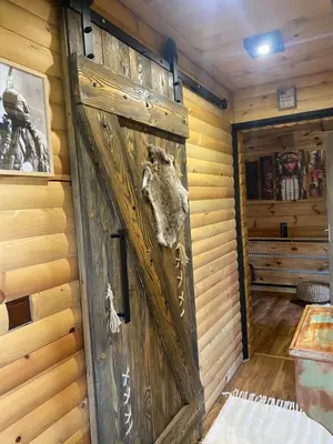 a door with a deer head on it in a room at Villa INDIANA Devin in Devin