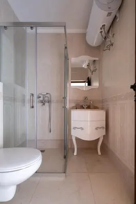 a bathroom with a shower and a sink and a toilet at 5 Villa Vitosha Classic Stays in Hisarya