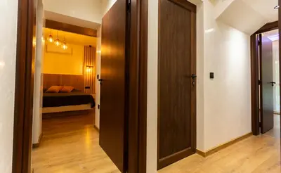 a hallway with a door leading to a bedroom at Forest Nest in Krayni Dol