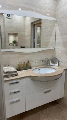 a bathroom with a sink and a mirror at Cosy apartment 11Mins Center in Plovdiv