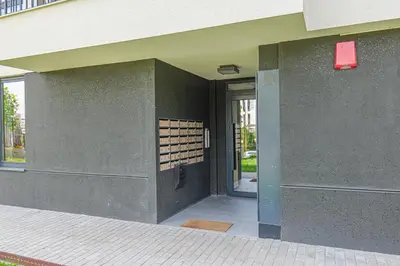 an entrance to a building with an open door at Brand New Vitosha View Apartment - Free Parking - Metro Access in Sofia