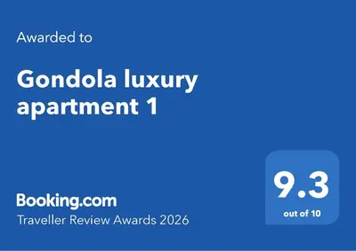 a blue sign with the words gonzalo luxury apartment at Gondola luxury apartment 1 in Bansko