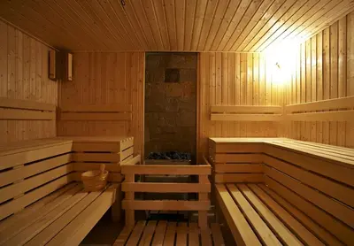 a wooden sauna with two benches in it at Приказна гледка B5 2 in Borovets