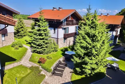 an overhead view of a house with a garden and trees at Hrebet House in Borovets
