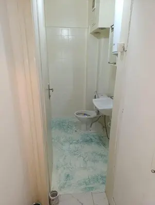 a bathroom with a toilet and a sink at АПАРТАМЕНТ ДВЕ СТАИ ДО МЕТРОСТАНЦИЯ ВАРДАР Apartment In West Park near Subway in Sofia