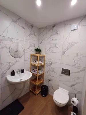 a bathroom with a sink and a toilet at Borovets Gardens Forest STUDIO A3 - FREE PARKING,Free baby cot in Borovets