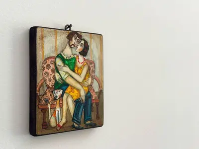 a picture of a painting of a woman holding a man at 2 Apartments, 2 Parking - Sleeps 8 - Quiet Central in Sofia