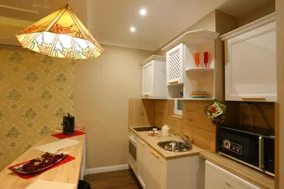 a kitchen with a sink and a microwave at Apartment in Sofia Centre by Flat Manager in Sofia