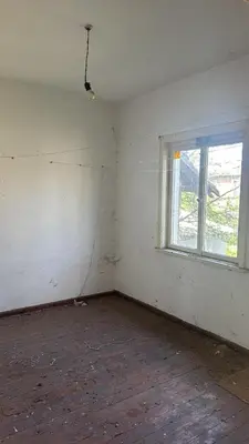 an empty room with a window and white walls at Pazardzhik Shelter House 3 Empty Rooms, No Electric, No Water, No WC, Free Car Parking, Glavinitsa Self Check-in