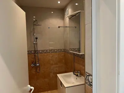 a bathroom with a shower and a sink at South Park in Sofia