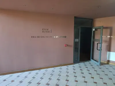 an empty room with a glass door on a wall at Pirin View Apartment in Bansko