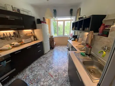 a kitchen with a sink and a counter top at Journalist squad in Sofia