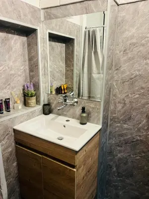 a bathroom with a sink and a mirror at Boby Center Home in Sofia