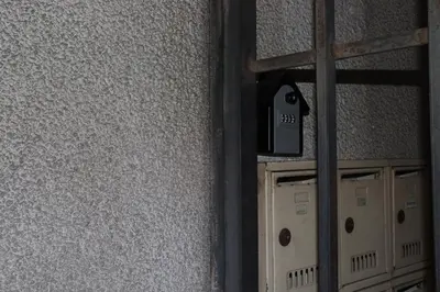 a door with a clock on the side of a wall at Комфортен апартамент, безплатно гараж! in Sofia