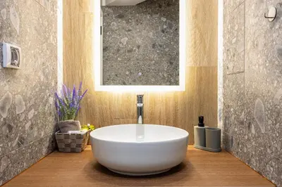 a bathroom with a large white tub in a room at Two Stylish 1BD Apartments with Desk in Karshiaka by Flat Manager in Plovdiv
