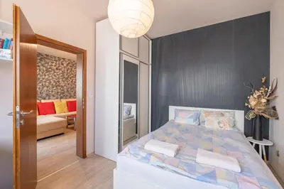a bedroom with a large bed in a room at Modern Apartment - Top Location - Friendly Host by Flat Manager in Sofia