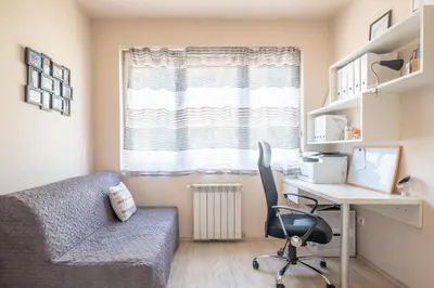 a room with a desk and a chair and a computer at Modern Apartment - Top Location - Friendly Host by Flat Manager in Sofia
