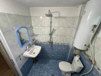 a bathroom with a toilet and a sink at DJOKI Apartment in Sandanski