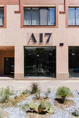 a building with an ak sign on the front of it at А17 Plovdiv Apartments - Next to Rowing Channel and University hospitals in Plovdiv
